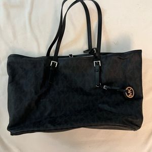 Michael Kors signature tote bag logo